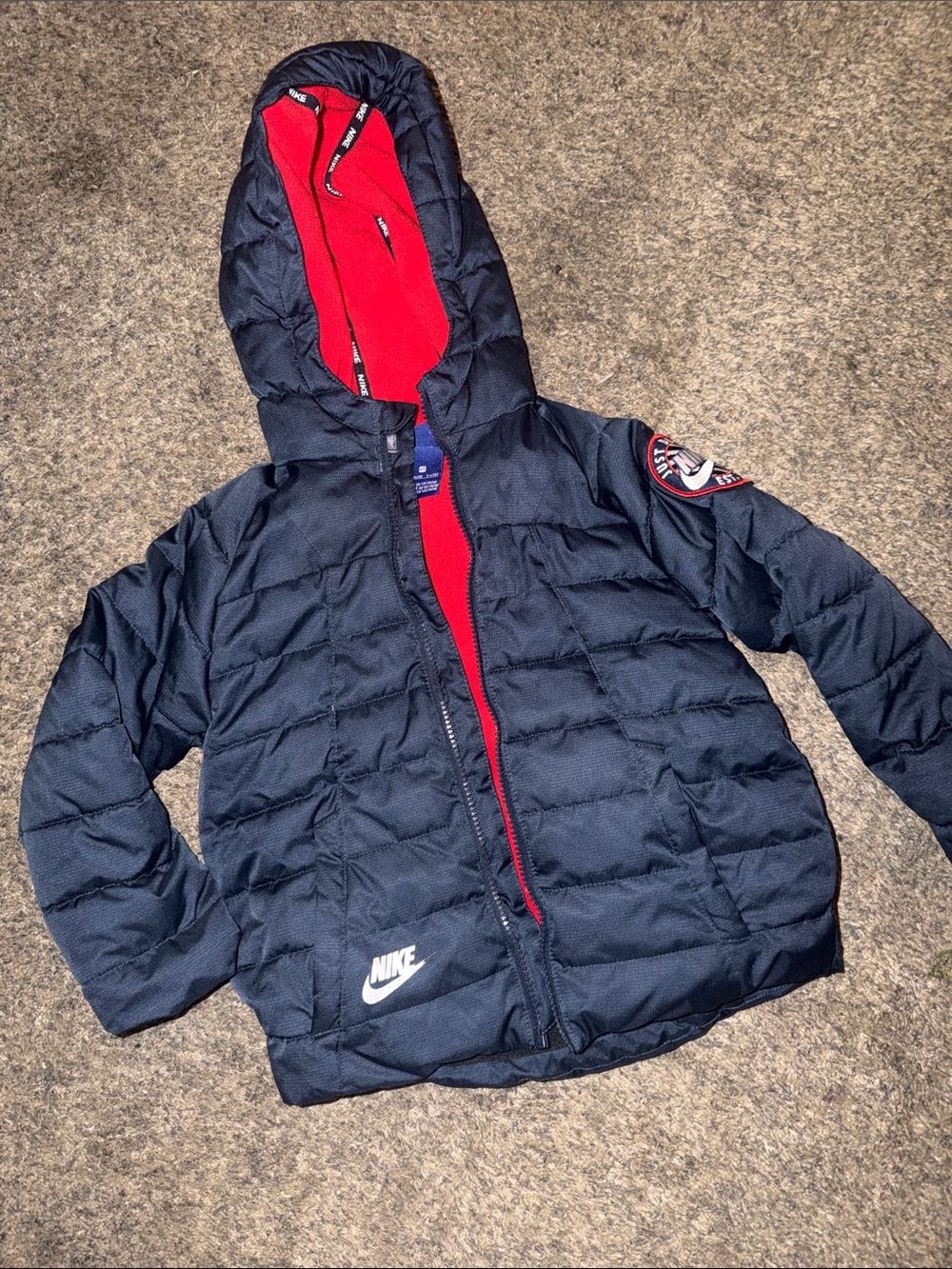 Nike Kids Navy Puffer Jacket with Red Lining and Hood